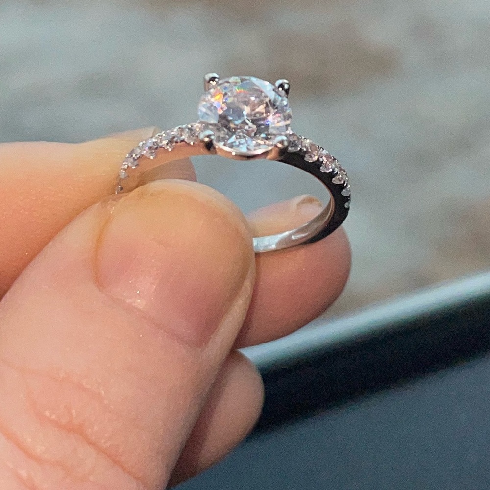 Size 6 2 and 3 quarters carat moissanite diamond ring.